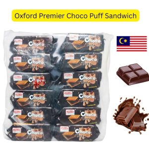 Oxford Premier Choco Puff Sandwich (မလေးရှားနိုင်ငံထုတ် အဆင့်မြင့်မုန့်အမျိုးအစားဖြစ်ပြီး အပြင်ဘက်တွင် ကြွပ်ရွသော ဘီစကစ် (Crispy outside) နှင့် အတွင်းဘက်တွင် နက်ရှိုင်းစိမ့်အိနေသော ချောကလက်ကရင်မ် (Creamy inside) တို့ကို ဆန်းသစ်စွာ ပေါင်းစပ်ဖော်စပ်ထားကာ ခန္ဓာကိုယ်အတွက် စွမ်းအင်နှင့် အာဟာရကို ချက်ချင်းဖြည့်တင်းပေးနိုင်ခြင်း၊ လက်ဖက်ရည်၊ ကော်ဖီ၊ နို့တို့နှင့် အလွန်လိုက်ဖက်ခြင်း စသည့်အကျိုးကျေးဇူးများကို ပေးစွမ်းနိုင်ပြီး အထဲတွင် အထုပ်သေး ၁၂ ထုပ်ခွဲပါဝင်ကာ စုစုပေါင်း အလေးချိန် ၂၂၈ ဂရမ် (228g) ဝင် ပရီမီယံ ချောကလက်ကရင်မ်ညှပ်မုန့်ထုပ်ကြီး)